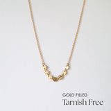 Gold Filled 7 Pressed Disc Necklace